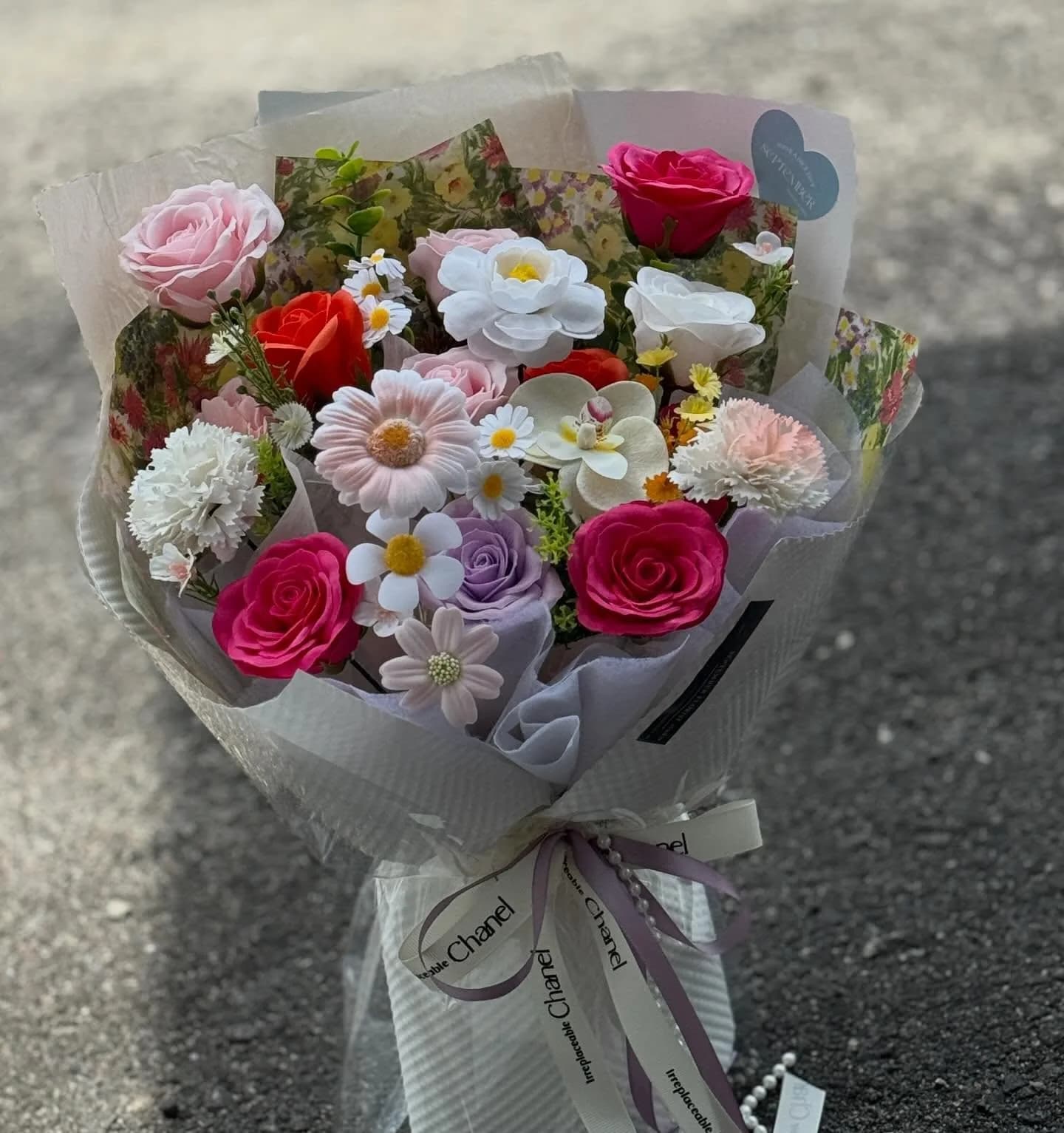 Carnival Bloom — Roses, daisies, carnations in fuchsia, red and white