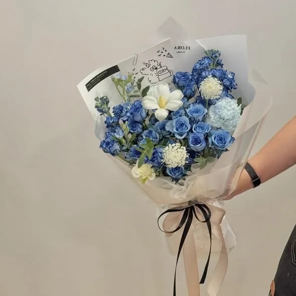 Recent arrangement by September Florist Studio, 1 of 6